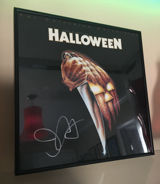 A copy of Halloween on LaserDisc, signed by John Carpenter